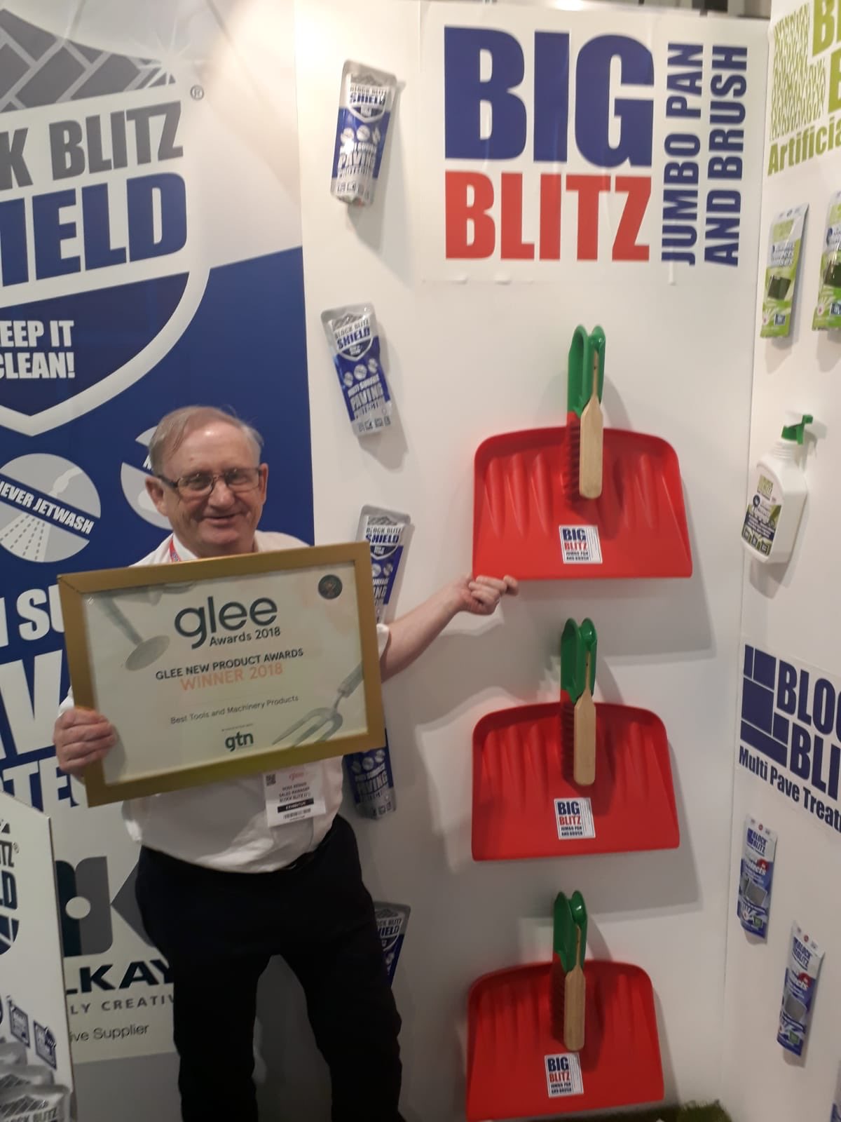 Ross Rennie shows off the award certificate